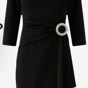 Elegant Black Dress with Embellished Detail
